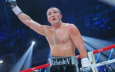 Российский боксер Денис Лебедев нокаутом отстоял чемпионский пояс